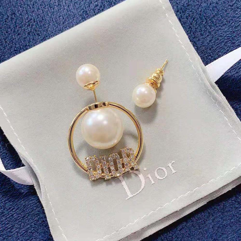 Side angle showing asymmetric silhouette of Dior Women Tribales Earrings
