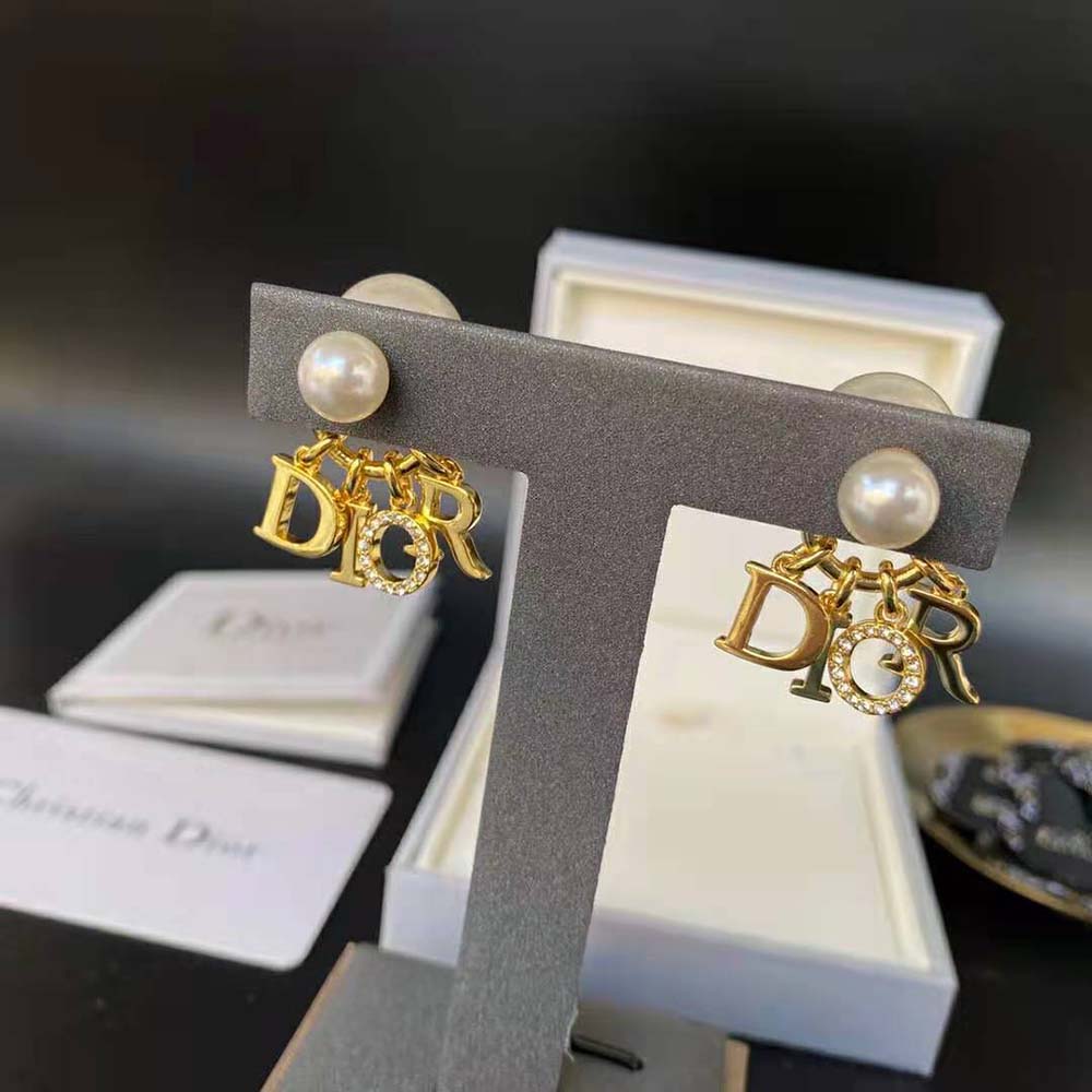Close-up of white crystal detailing on Dior Women Tribales Earrings