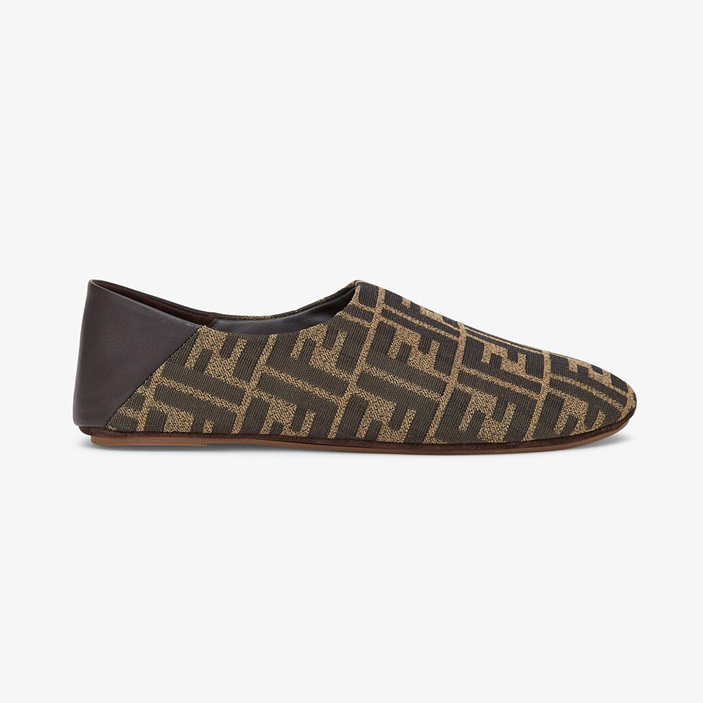 Side angle of Fendi Unisex Signature Brown Fabric Slippers showing silhouette