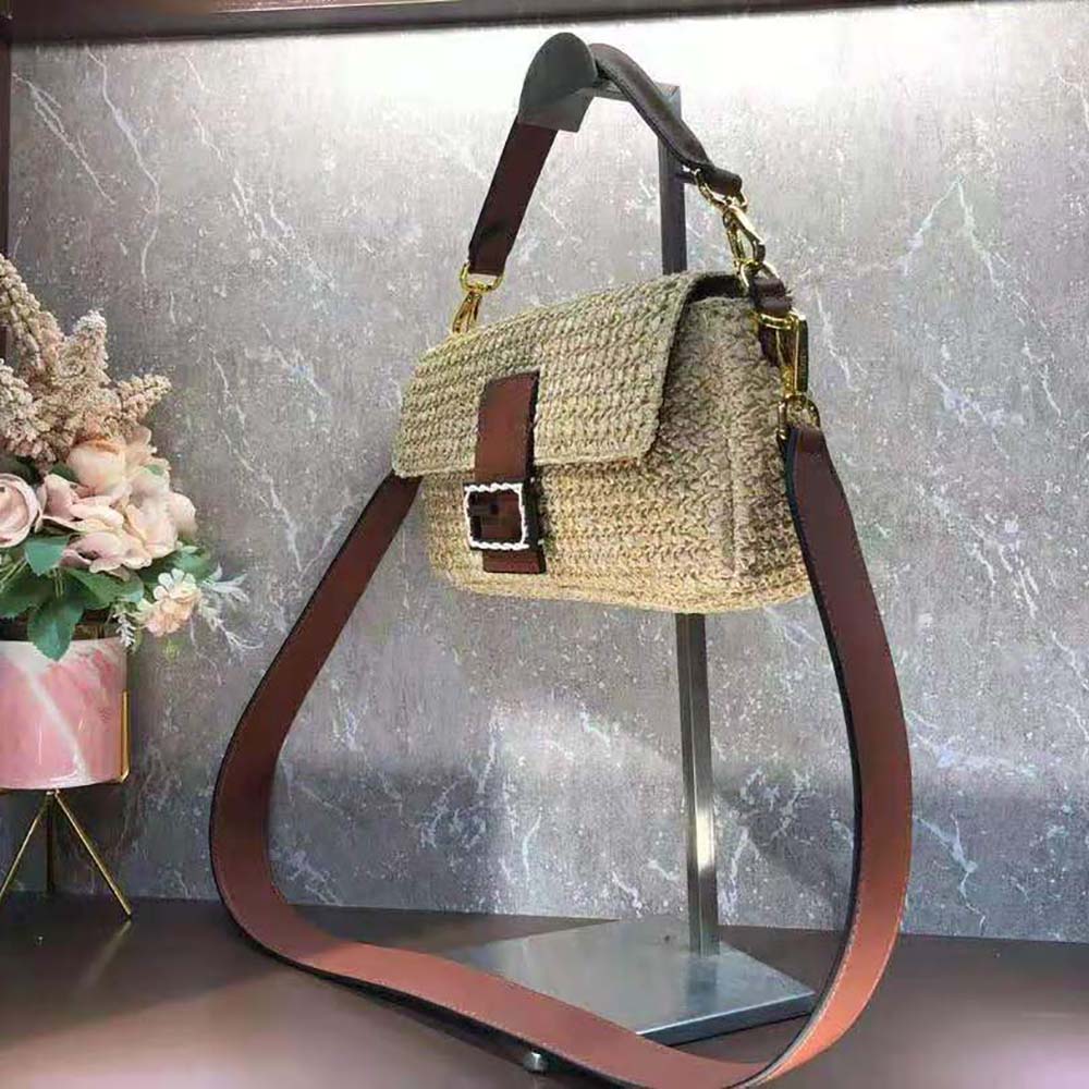 Side profile showing adjustable strap on Fendi Women Baguette Woven Straw Bag-Beige