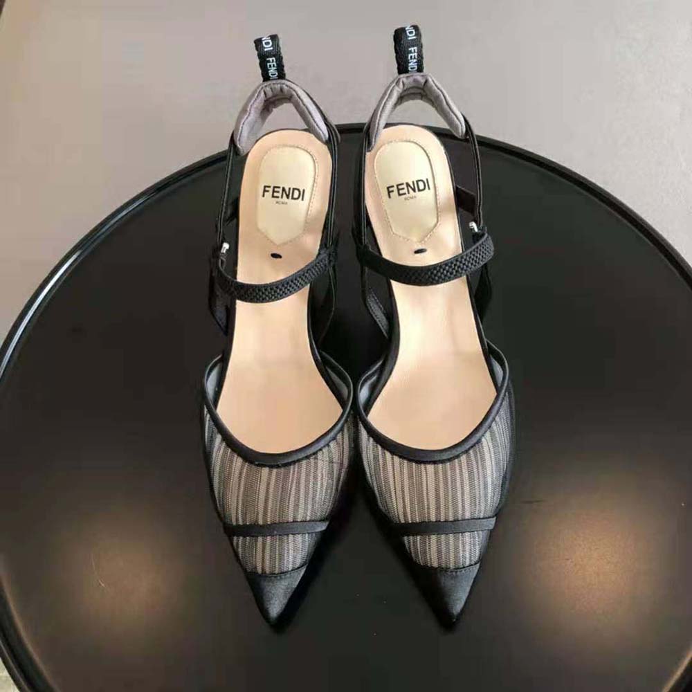 Close-up of black tulle and gold hardware on Fendi Colibri Lite slingbacks