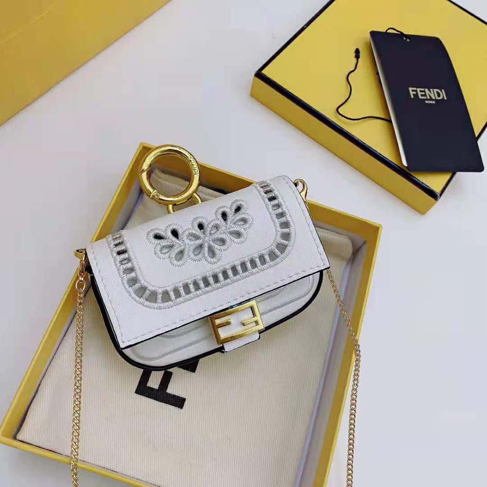 Side angle showing compact shape of Fendi Women Nano Baguette Charm
