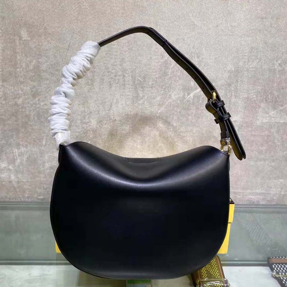 Side angle highlighting smooth black leather texture on Fendi Women Small Croissant Black Leather Bag