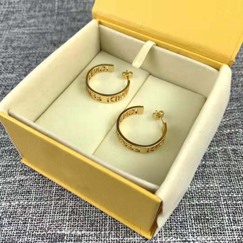 Side angle of Fendi Women Small Signature Earrings Gold-colored with post closure