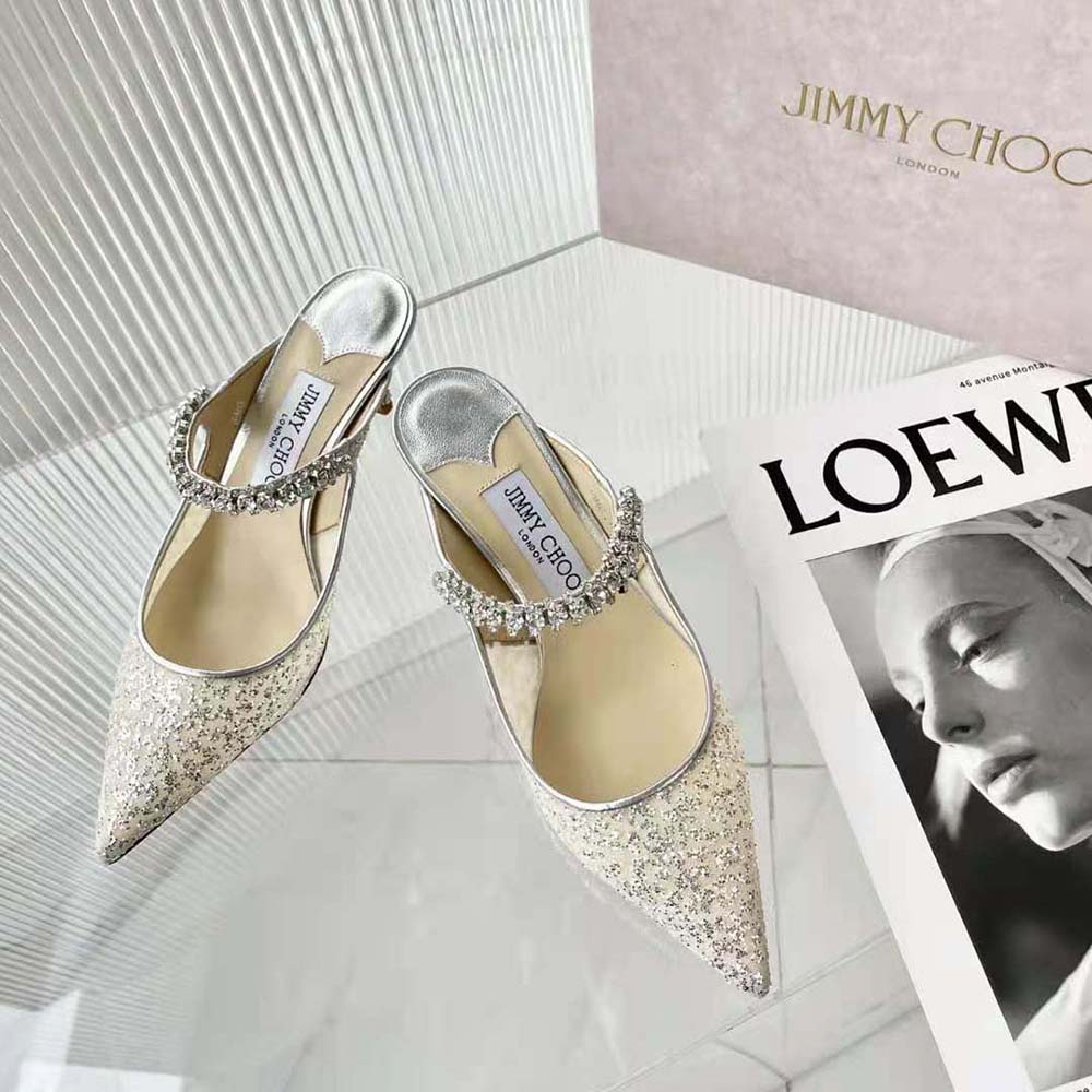 Close-up of sparkling crystal strap on Jimmy Choo BING 100 Silver Glitter Mules