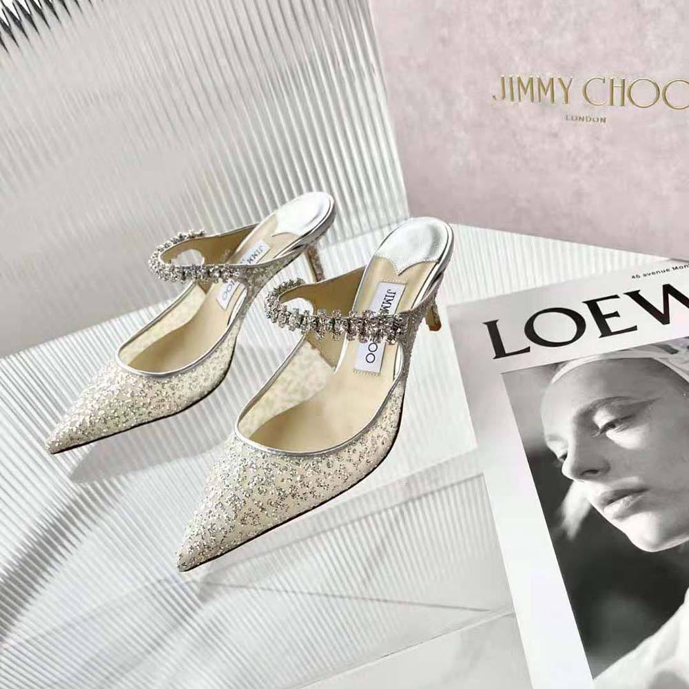 Rear angle showing open-back and high heel of Jimmy Choo BING 100 Silver Glitter Mules