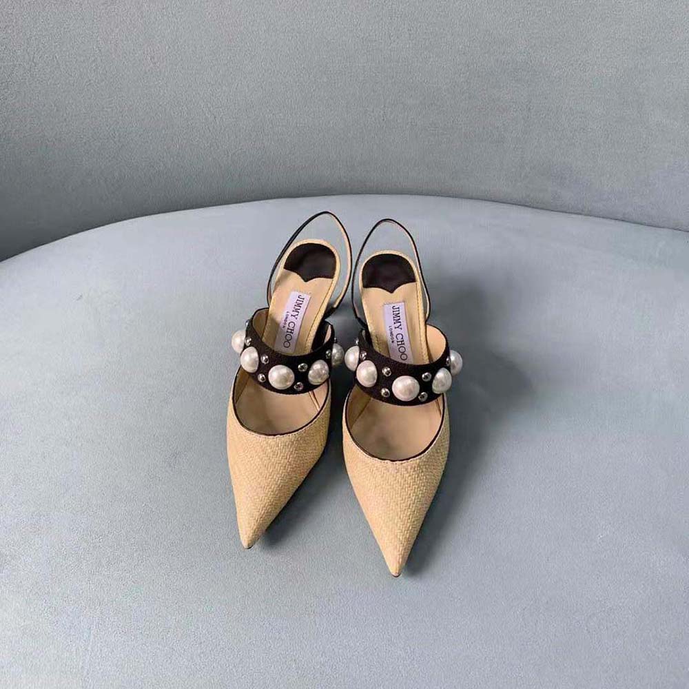 Close-up detail of pearl and stud embellishments on Jimmy Choo Breslin 100 slingback
