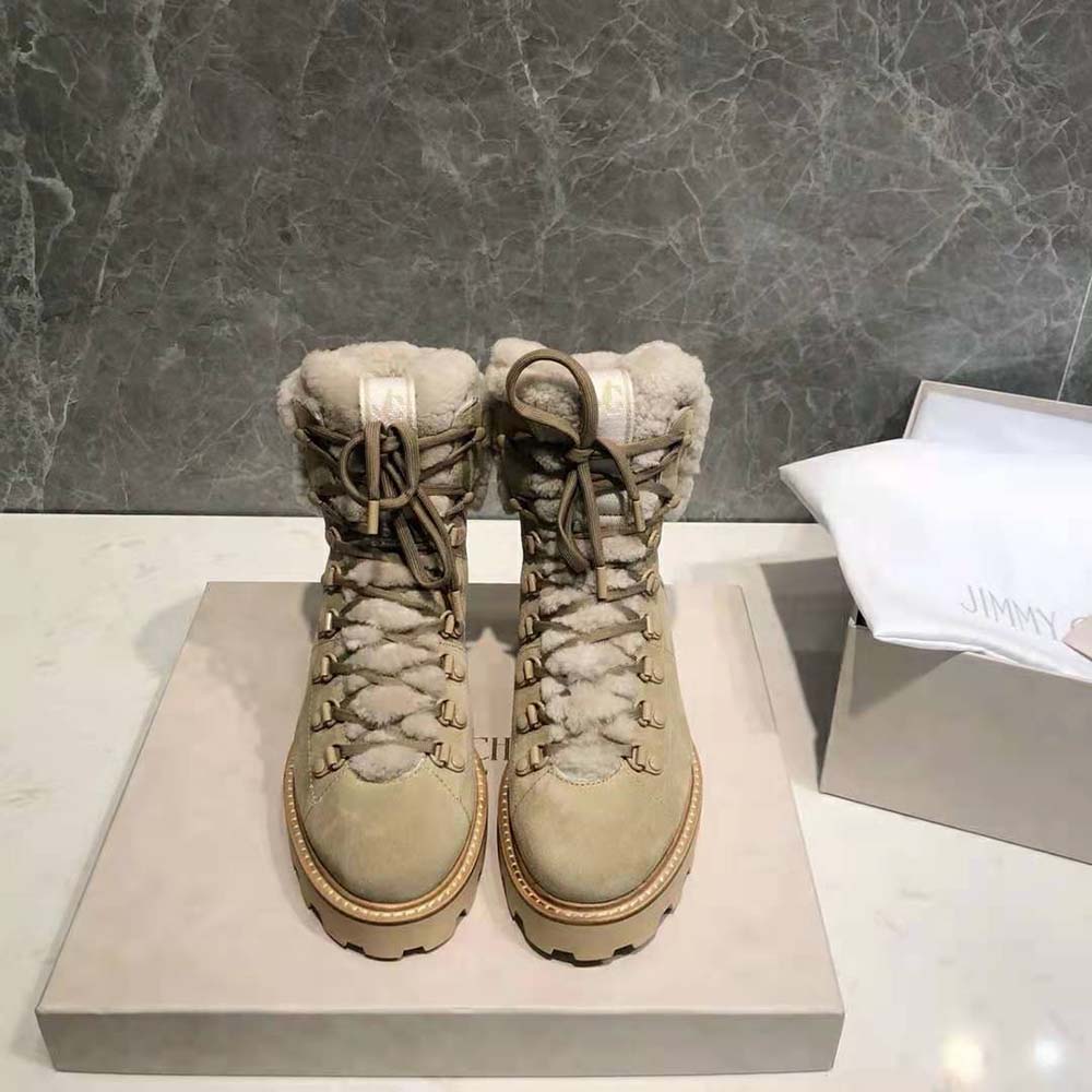 Close-up on shearling lining and suede texture of Jimmy Choo hiking boots