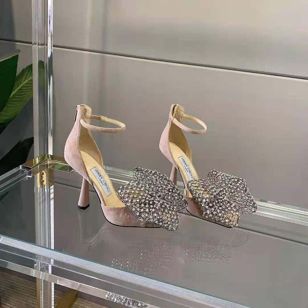 Rear angle showing heel and suede texture of Jimmy Choo Women Mana 100 sandals