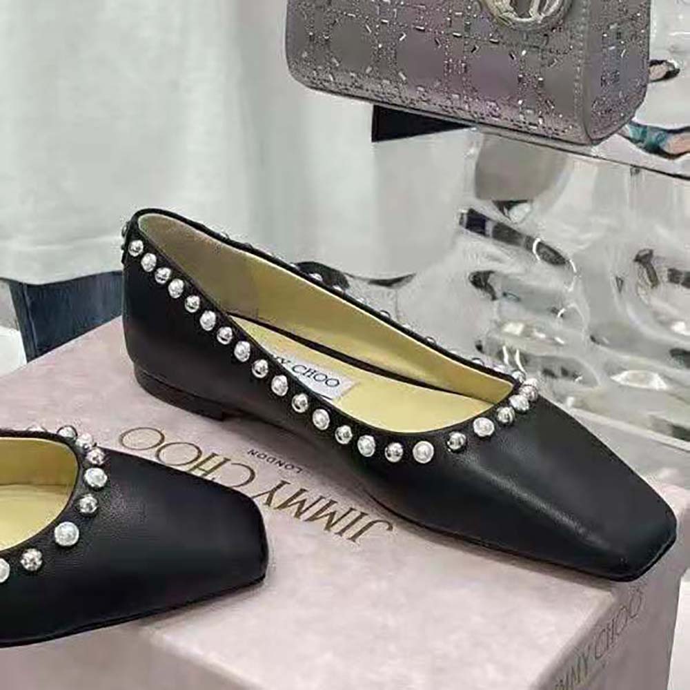 Side profile of Jimmy Choo Women Mirele Flat Black Nappa Leather Flats displaying silhouette