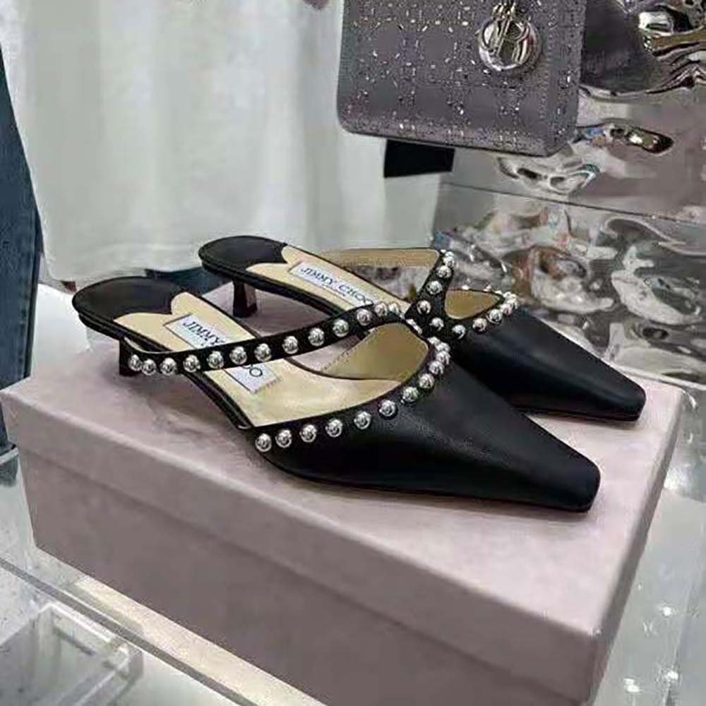 Close-up on silver dome studs detail on Jimmy Choo ROS 35 mules