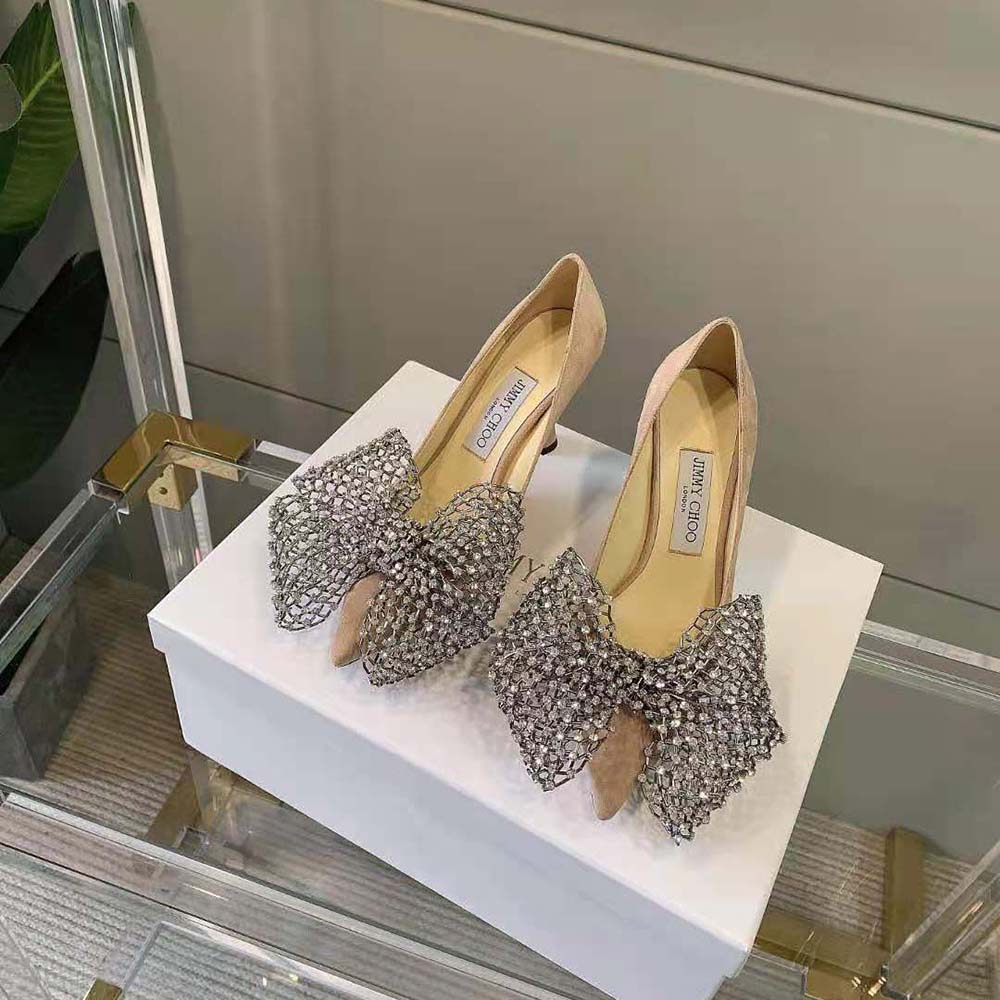 Close-up of crystal bow clasp on Jimmy Choo Seka 100 pumps