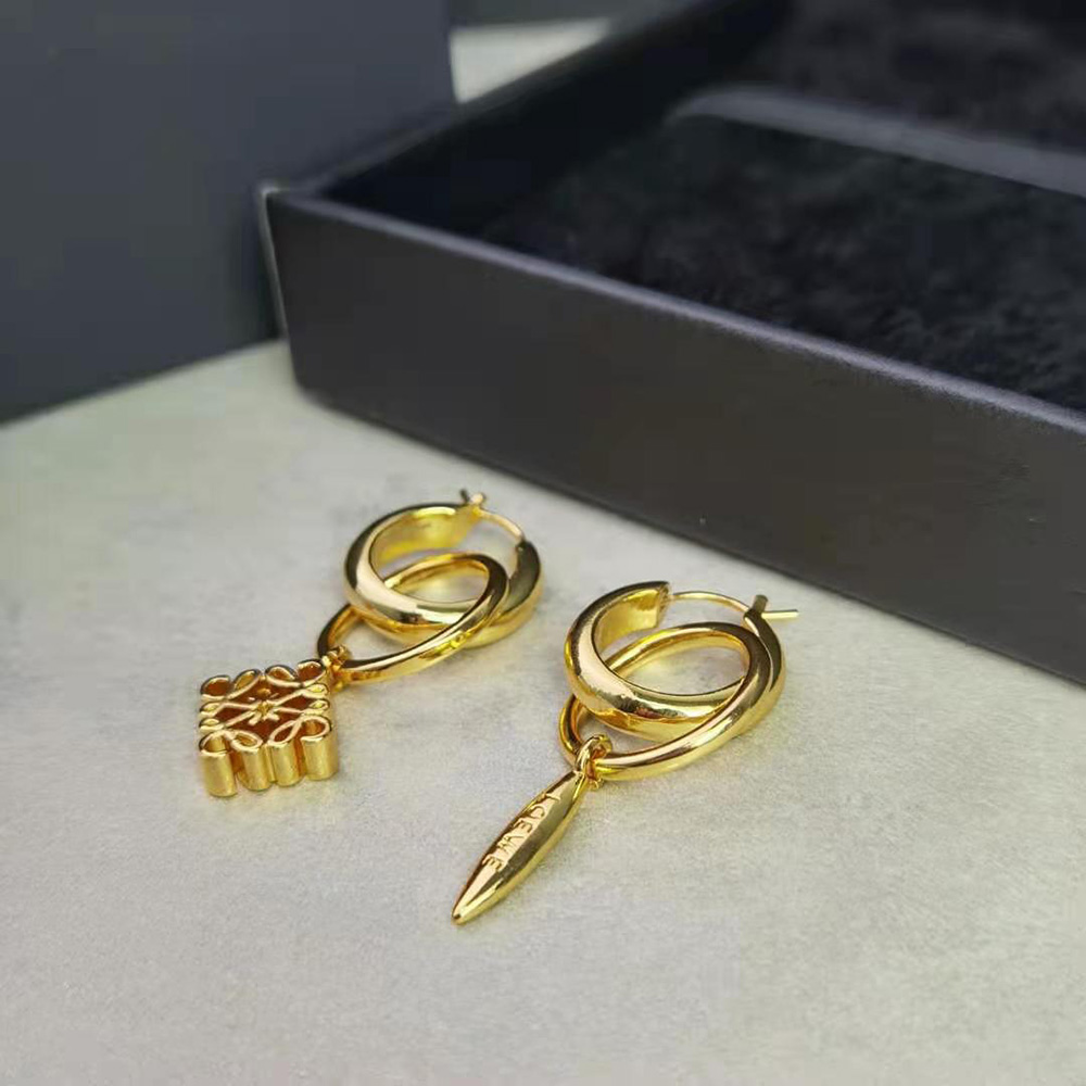 Side angle showing polished finish of Loewe Women Anagram Earrings