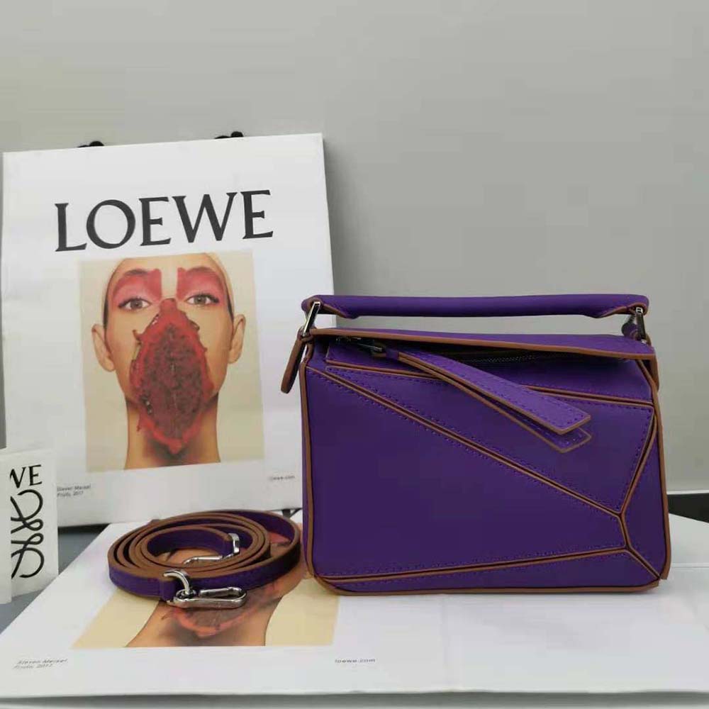Close-up of purple calfskin leather texture on Loewe Women Mini Puzzle Bag