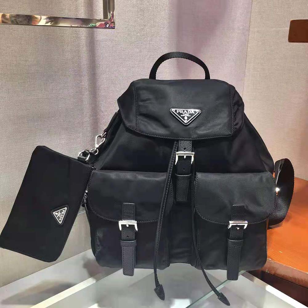 Close-up on silver-tone hardware of Prada Women Medium Nylon Backpack-Black