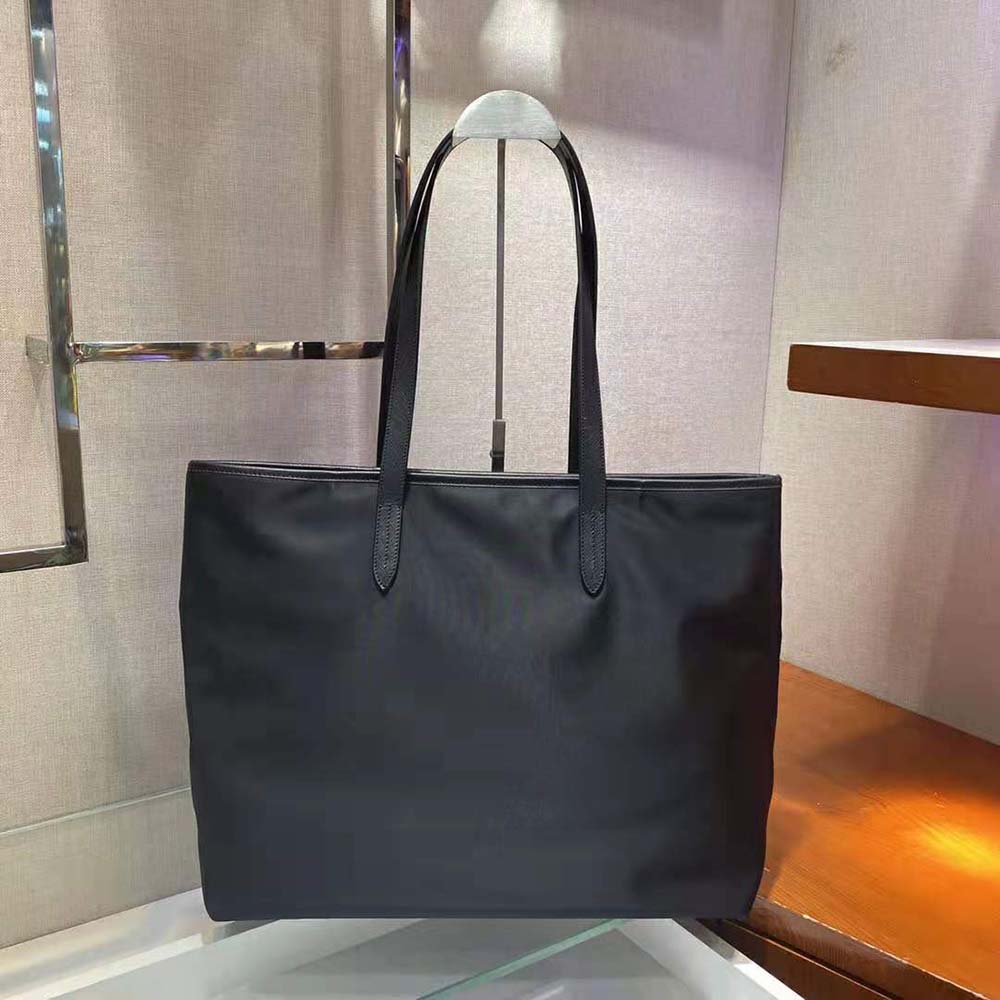 Side angle showing silver hardware on Prada Women Nylon Tote