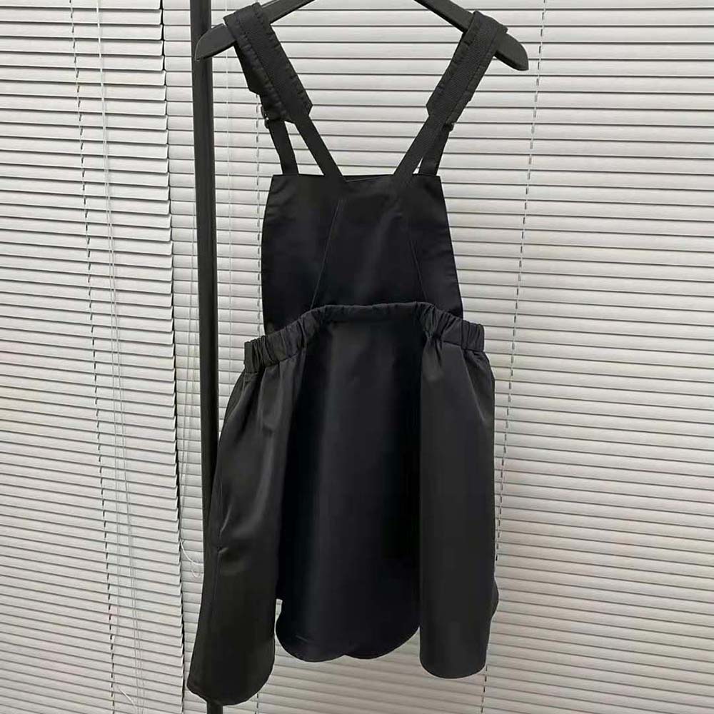 Side angle showing silhouette of Prada Women Re-Nylon Pinafore Dress