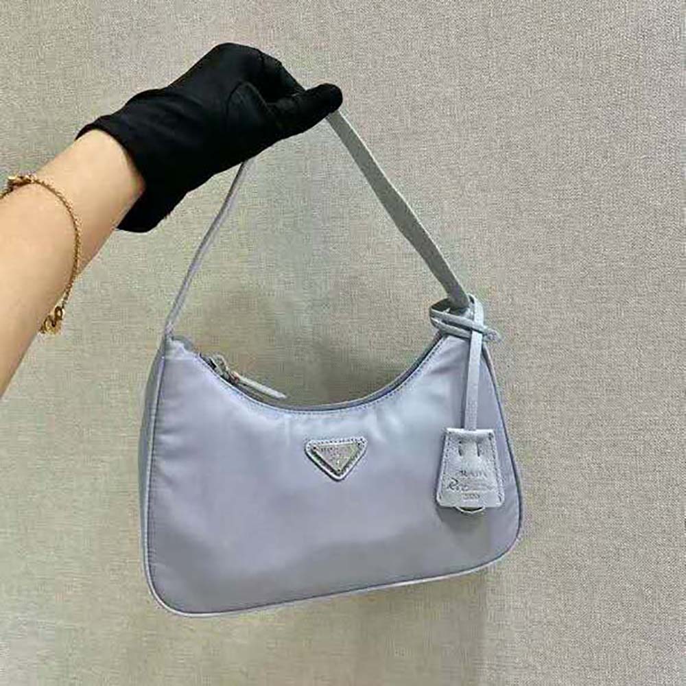 Close-up on silver-tone hardware and logo on Prada Women Re-Nylon Mini-Bag