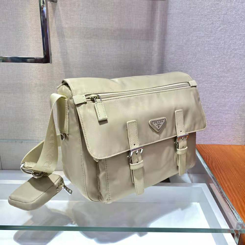 Side angle showing compact silhouette of Prada Women Re-Nylon Shoulder Bag-Beige