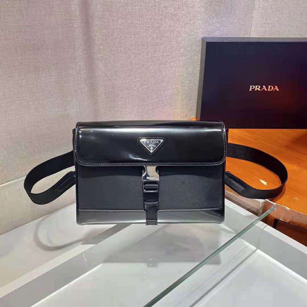 Close-up of silver hardware detail on Prada Women Re-Nylon and Leather Shoulder Bag-Black