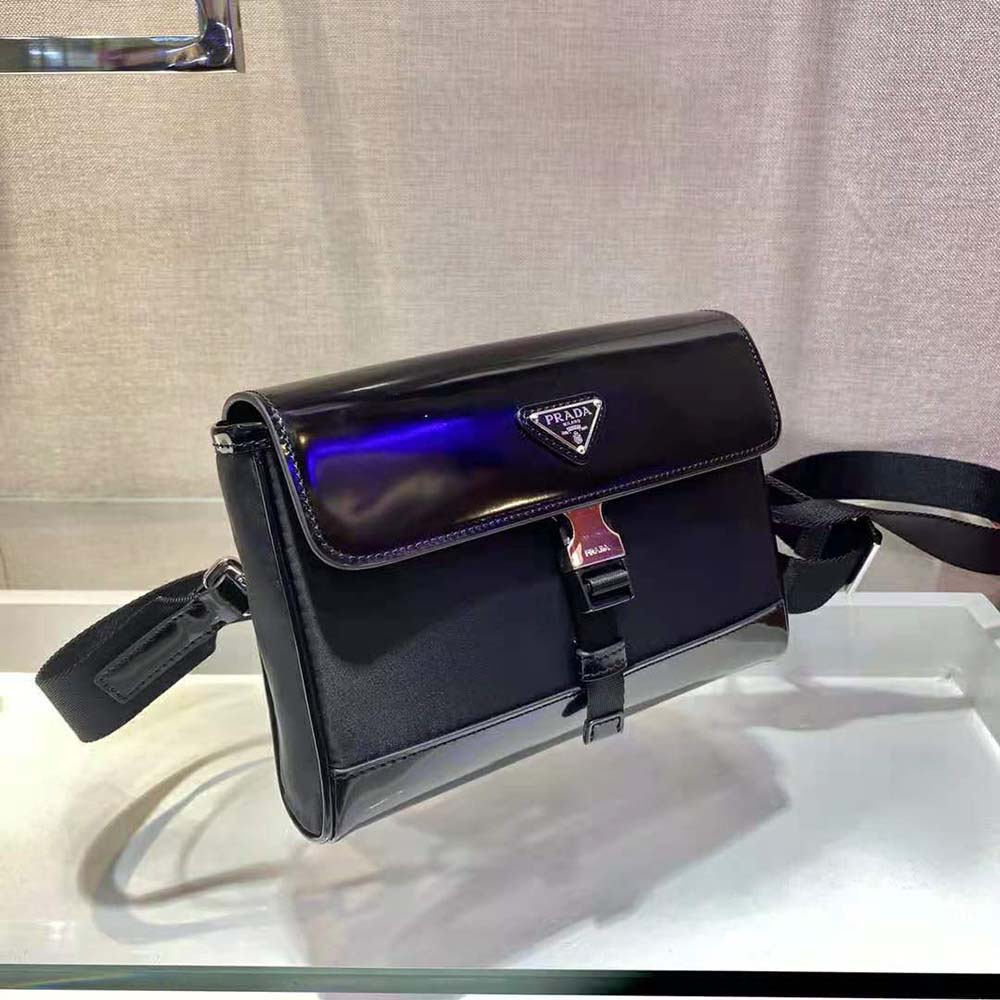 Side profile showing structured silhouette of Prada Women Re-Nylon and Leather Shoulder Bag-Black