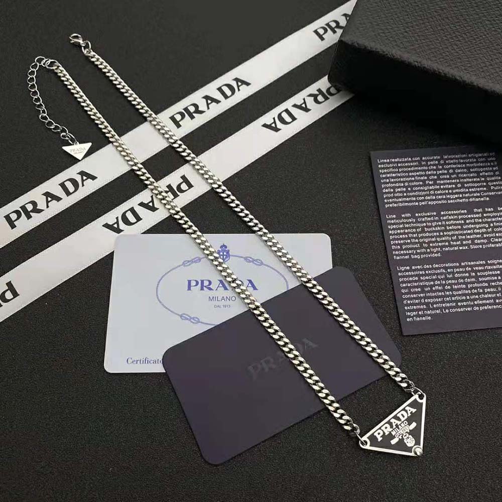 Close-up of Prada Women Symbole Necklace-Black signature logo clasp hardware