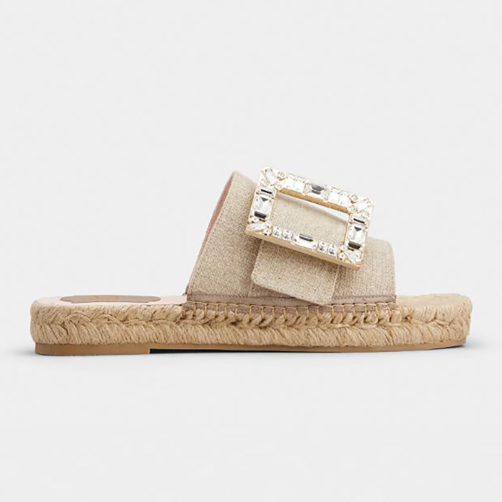 Side view of Roger Vivier Strass Buckle Espadrille Mules in Beige