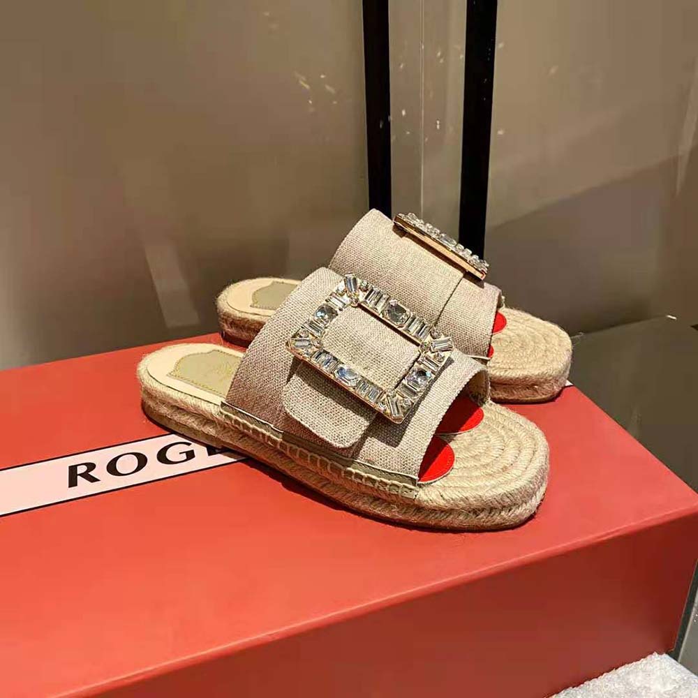 Close-up of sparkling strass buckle on Roger Vivier mules