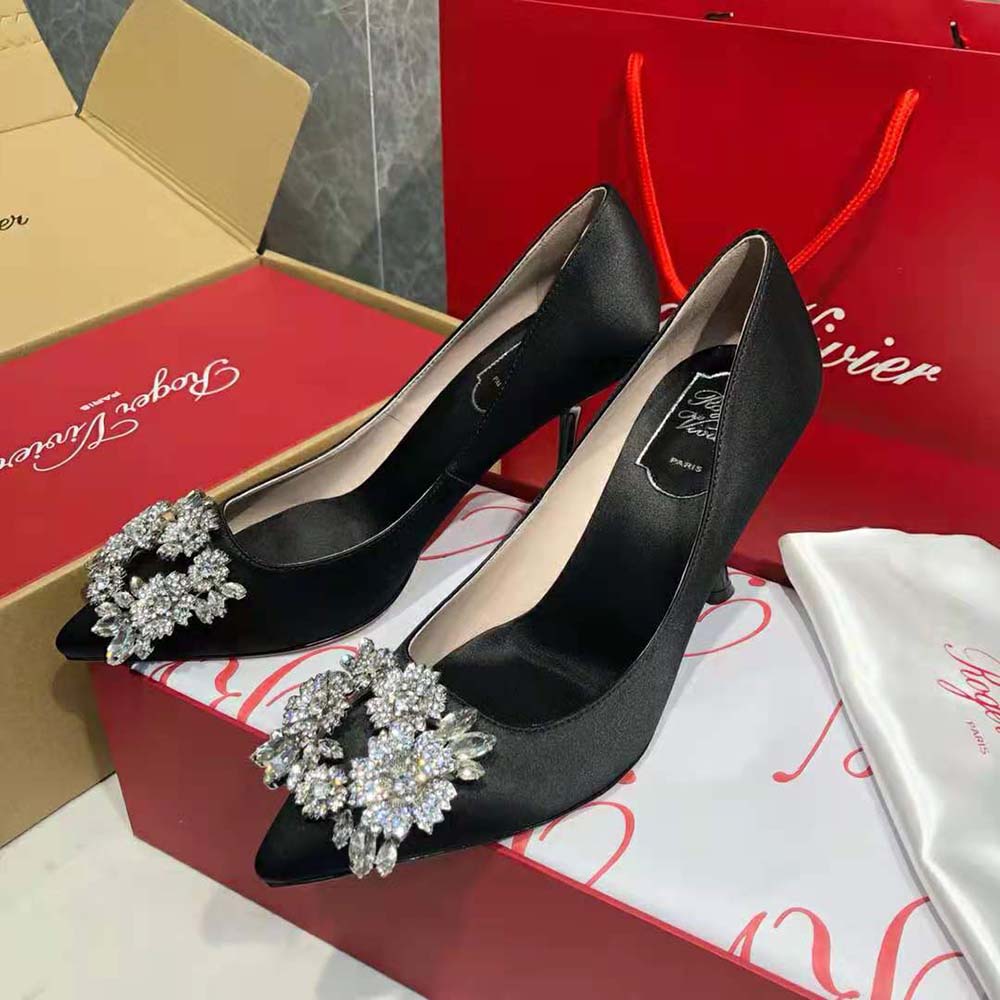 Side profile showing high heel silhouette of Roger Vivier Satin-Black pumps