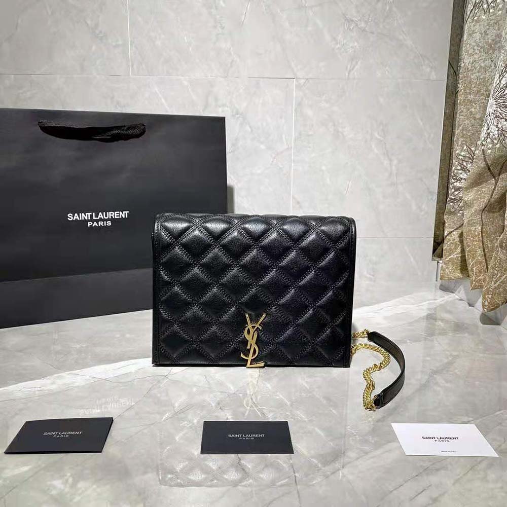 Close-up of gold YSL logo and carre-quilted lambskine texture
