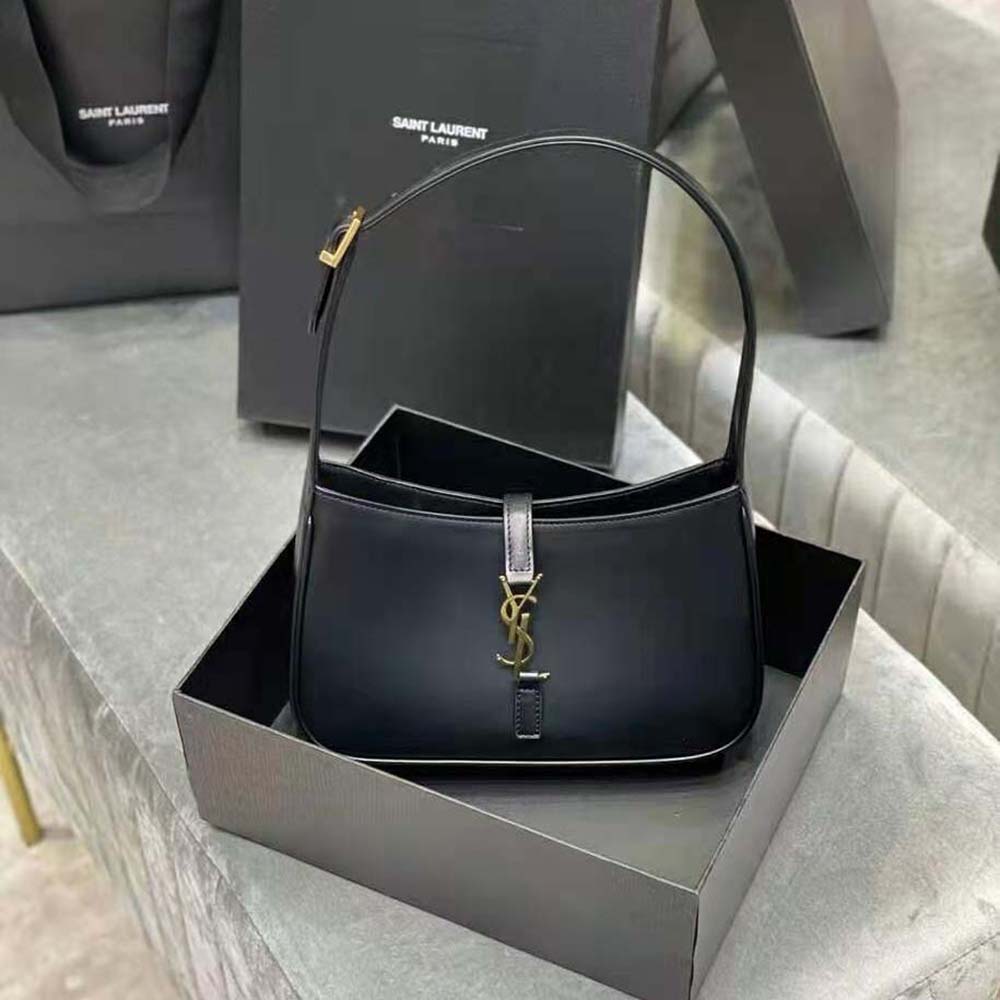 Close-up of gold YSL hardware on Saint Laurent Women LE 5 A 7 Hobo Bag