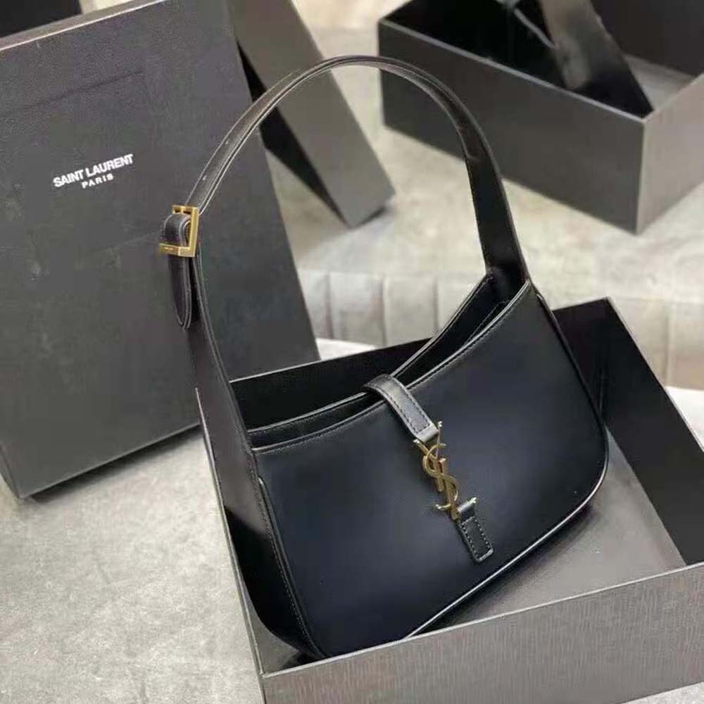 Side profile showcasing curved silhouette of Saint Laurent YSL Women LE 5 A 7 Hobo Bag