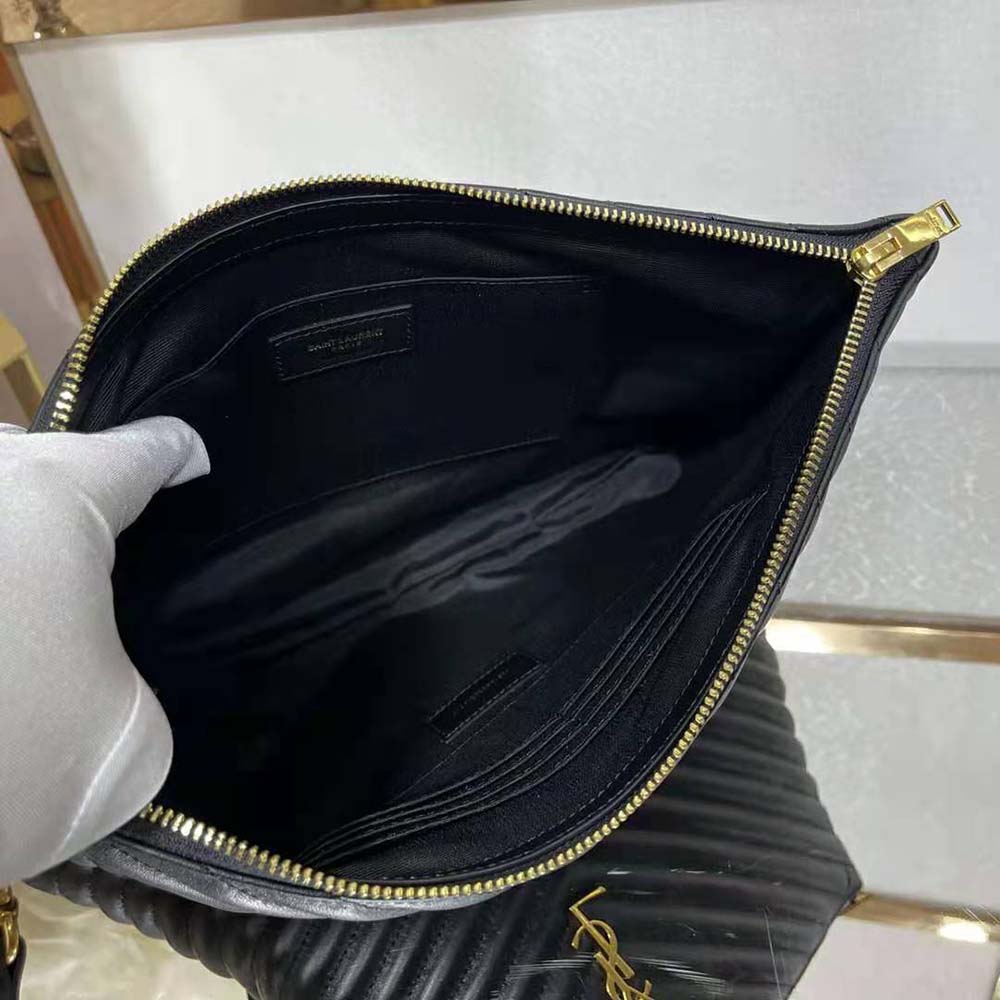 Side angle showing slim silhouette of Saint Laurent YSL A5 pouch