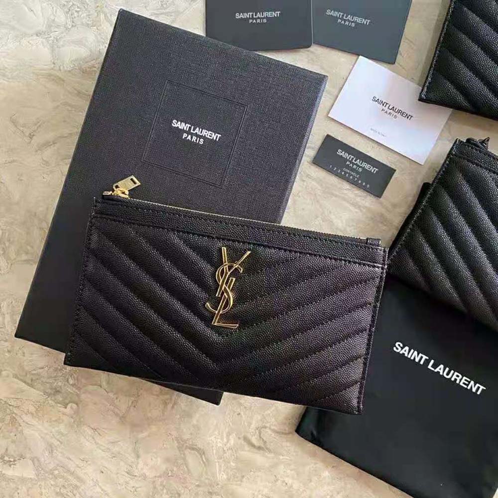 Side view showing zip closure and textured leather of Saint Laurent bill pouch