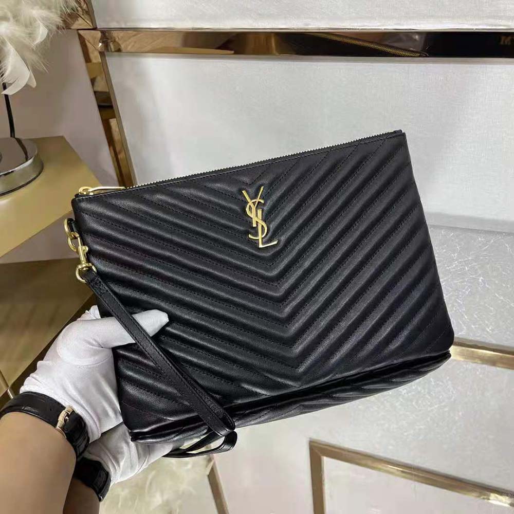 Side angle showing slim profile of Saint Laurent YSL tablet pouch