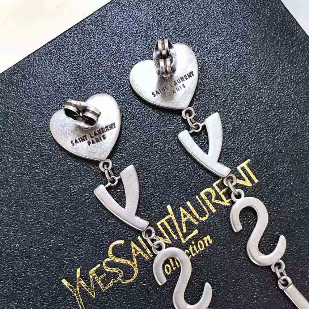 Side angle showcasing the push-back closure of Saint Laurent YSL Heart Earrings