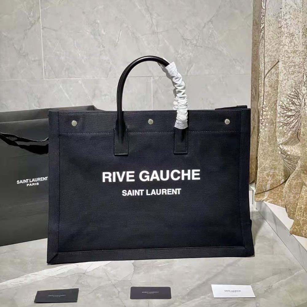 Close-up of gold YSL hardware on Saint Laurent YSL Women Rive Gauche Tote Bag