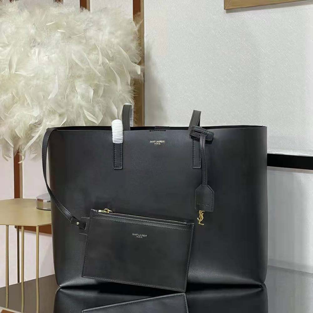 Top view showing interior lining and magnetic closure of Saint Laurent YSL bag