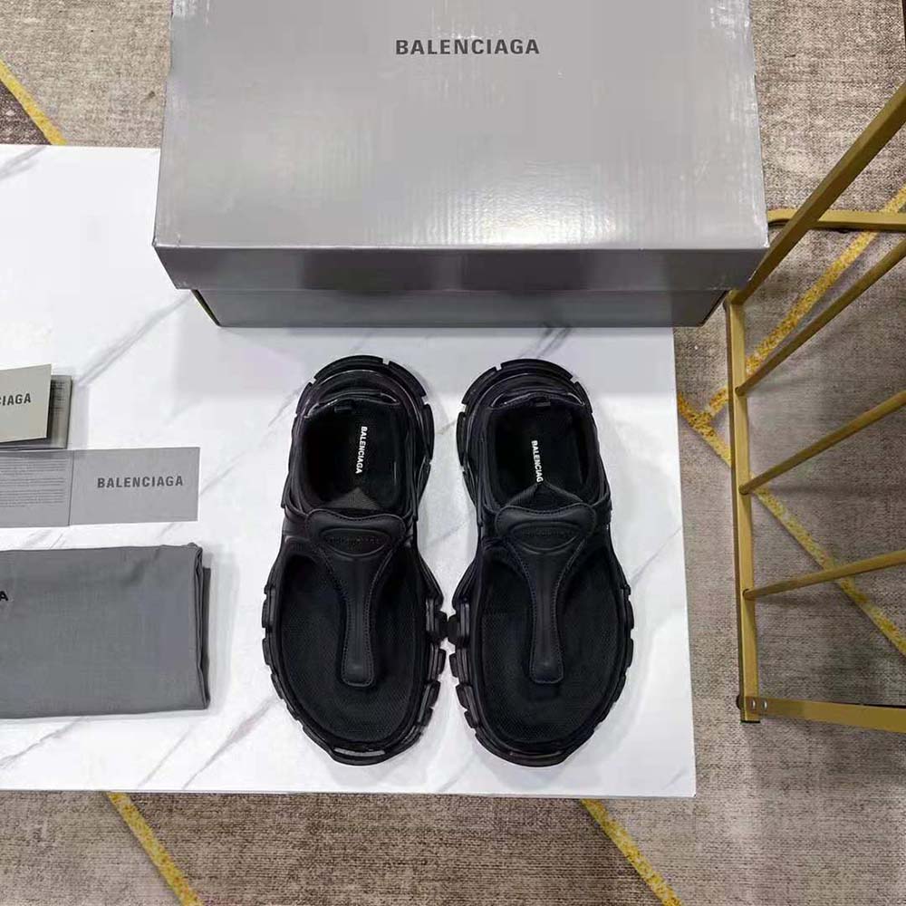 Close-up on black neoprene upper and rubber sole of Balenciaga Track Thong