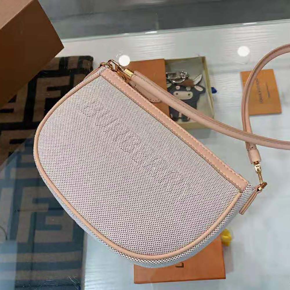 Side angle showing zipper closure and leather trimming on Burberry pouch