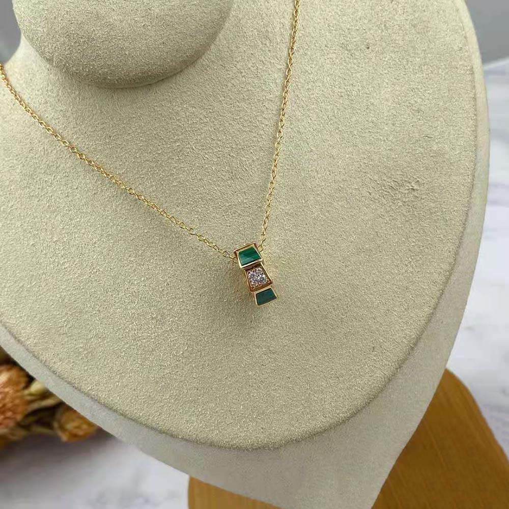 Close-up on green malachite elements of Bvlgari Women Serpenti Viper necklace