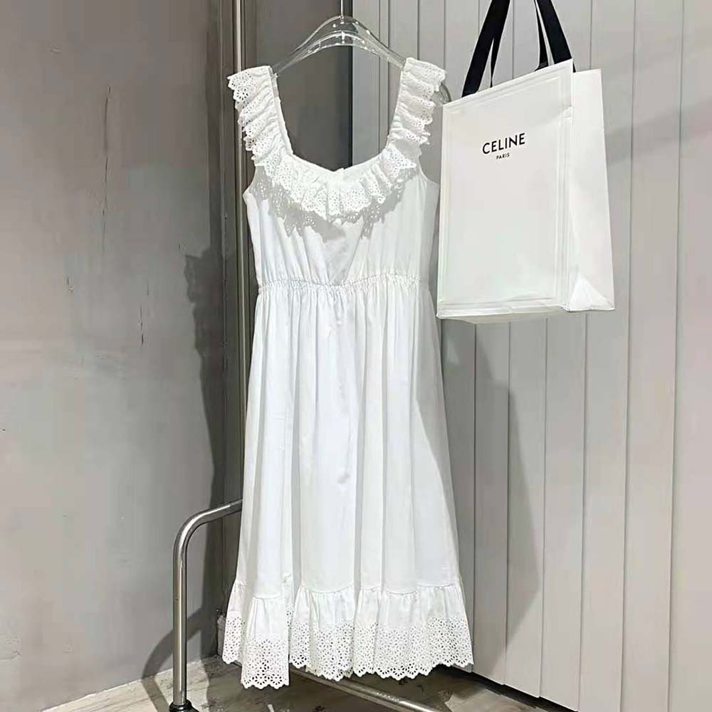 Side profile showcasing silhouette of Celine Women Prairie Dress in white