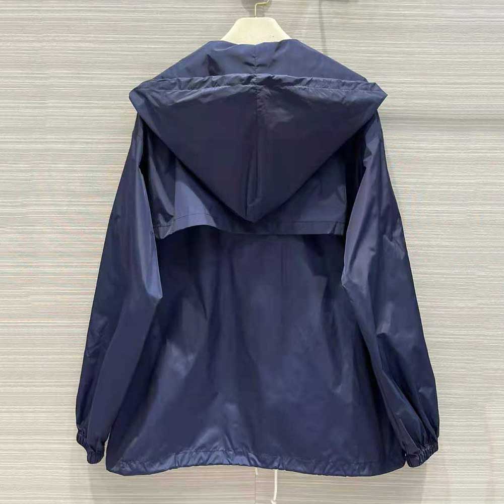 Side angle showing relaxed fit of Celine Women Windbreaker in blue