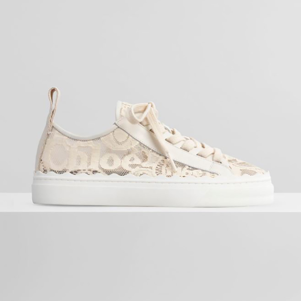 Side view of Chloe Women Lauren Sneaker in Lace-Sandy showing lace details