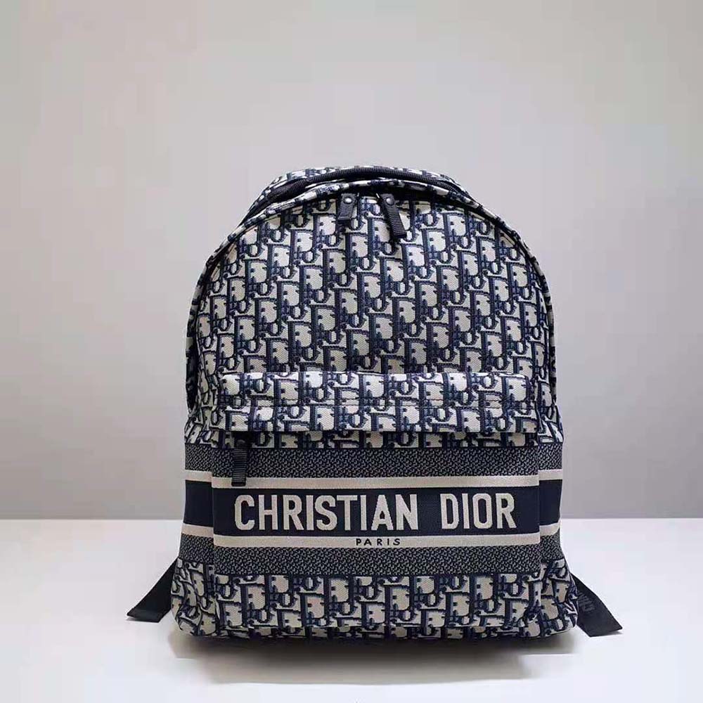 Close-up of silver hardware on Dior Men Travel Backpack blue jacquard