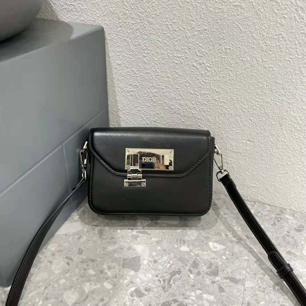 Side angle showing slim silhouette of Dior Men Messenger Pouch
