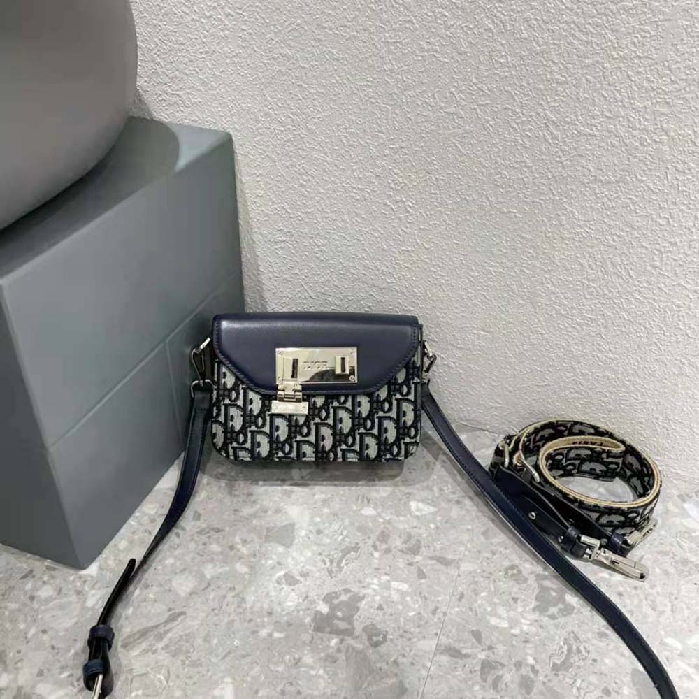 Close-up showing black smooth calfskin and silver Dior hardware
