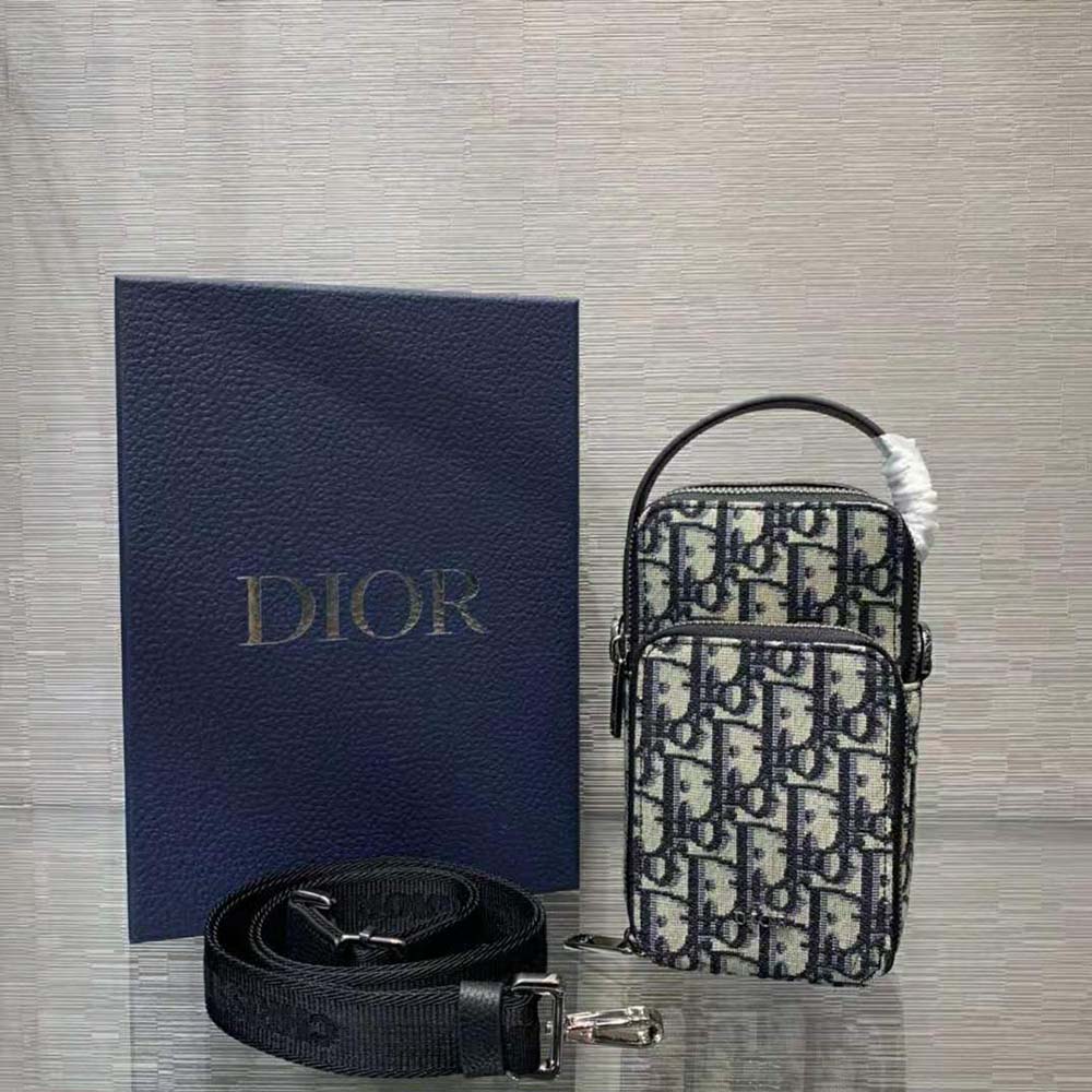 Close-up of signature Dior Oblique jacquard on Dior Men Pouch
