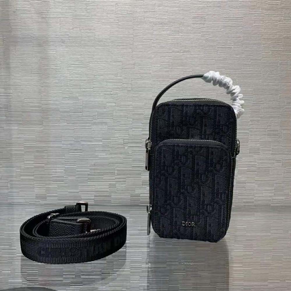 Side angle showing silver hardware on Dior Men Pouch Black