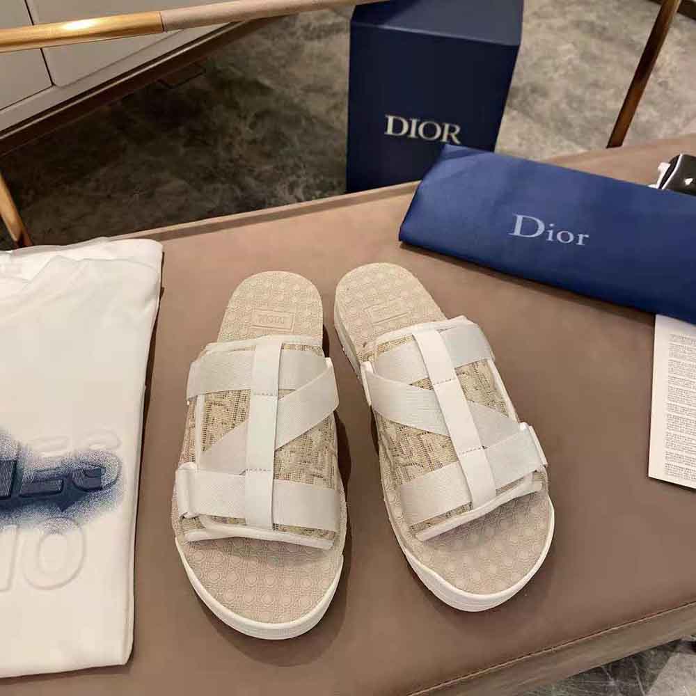 Close-up of silver Dior Oblique hardware on sandal strap
